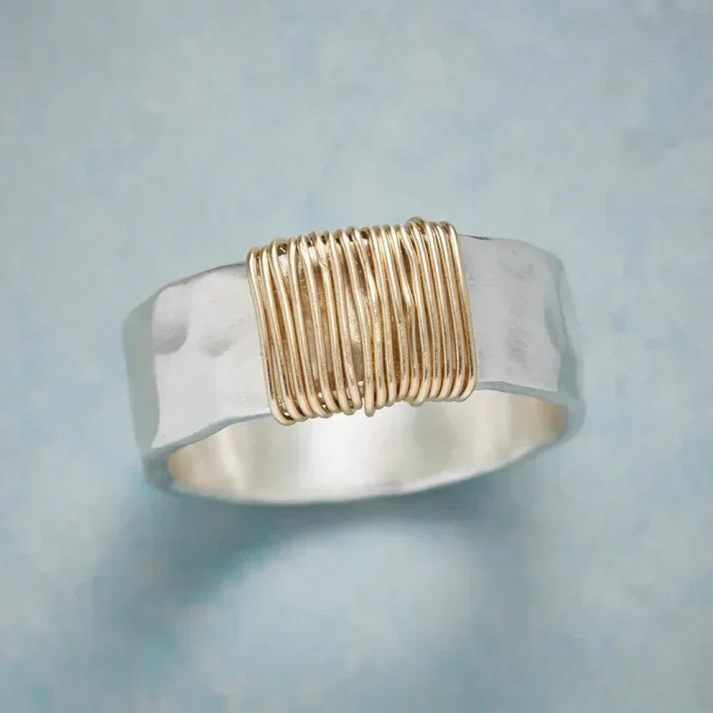 Antique Silver Ring Adorned with Golden Threads